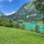 Lago di Tenno, acque turchesi e prato fiorito