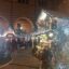 Mercatini di Natale a Verona illuminati di sera, casette con luci e decorazioni